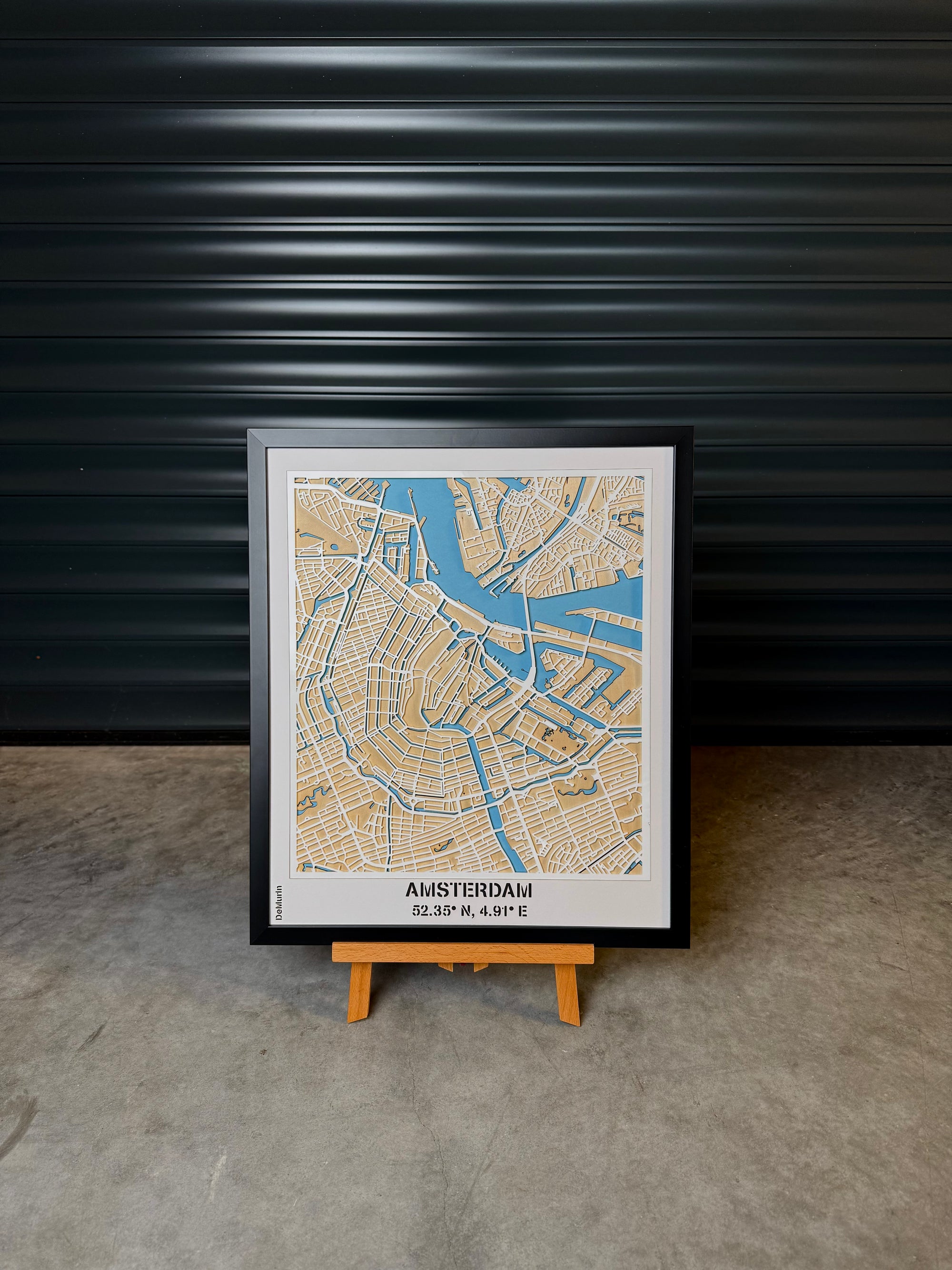 Amsterdam city map wall art displayed on wooden easel – handcrafted laser cut wooden street map with canals